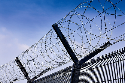 The difference between airport fence and stadium fence