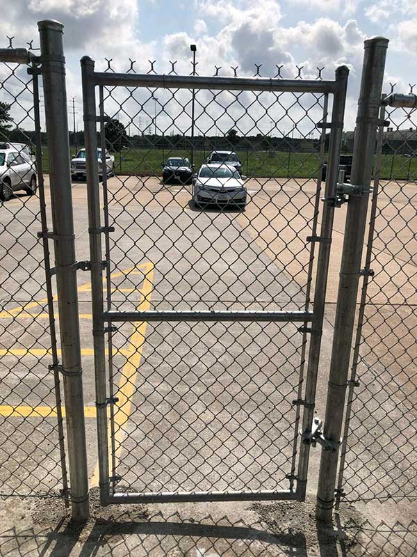 Chain link fence pedestrian gate